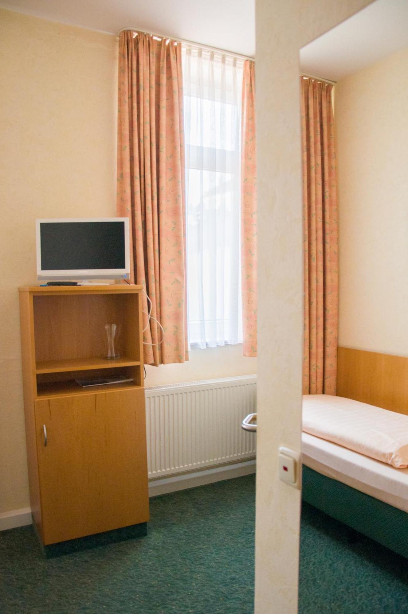 Domizil Alte Post Hotell Püttlingen Rom bilde